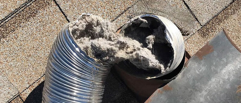Clogged dryer vent with dangerous lint buildup