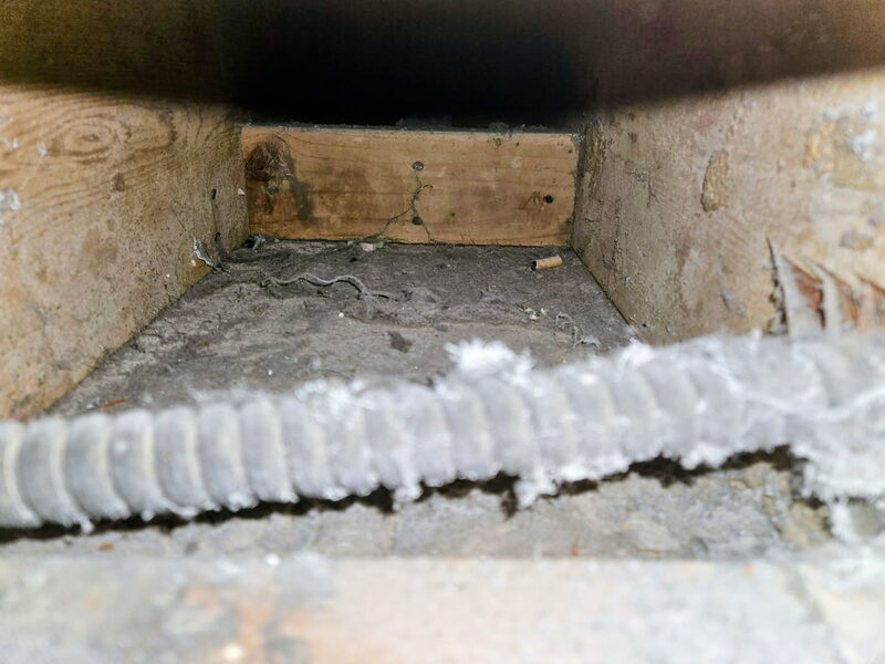 Professional duct cleaning in progress